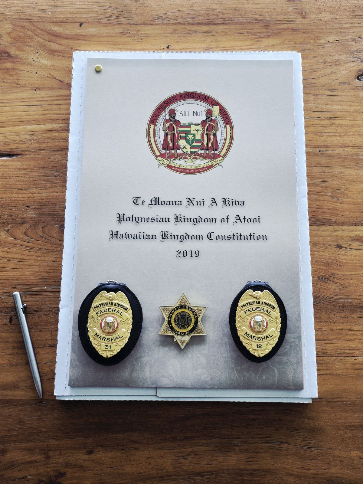 Constitution volume and insignia, Tahiti, 27 June 2025
